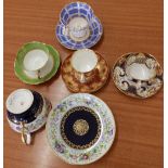 A late Sevres porcelain cup & saucer and four various cups & saucers. (10)