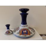 A British Navy Pusser's Rum ship's decanter together with a miniature. (2)