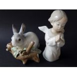 A Lladro rabbit and an angel. (2)