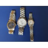 Two Seiko quartz wrist watches and one other. (3)