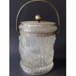 A Victorian EP mounted moulded glass biscuit barrel decorated with four playful monkeys to the