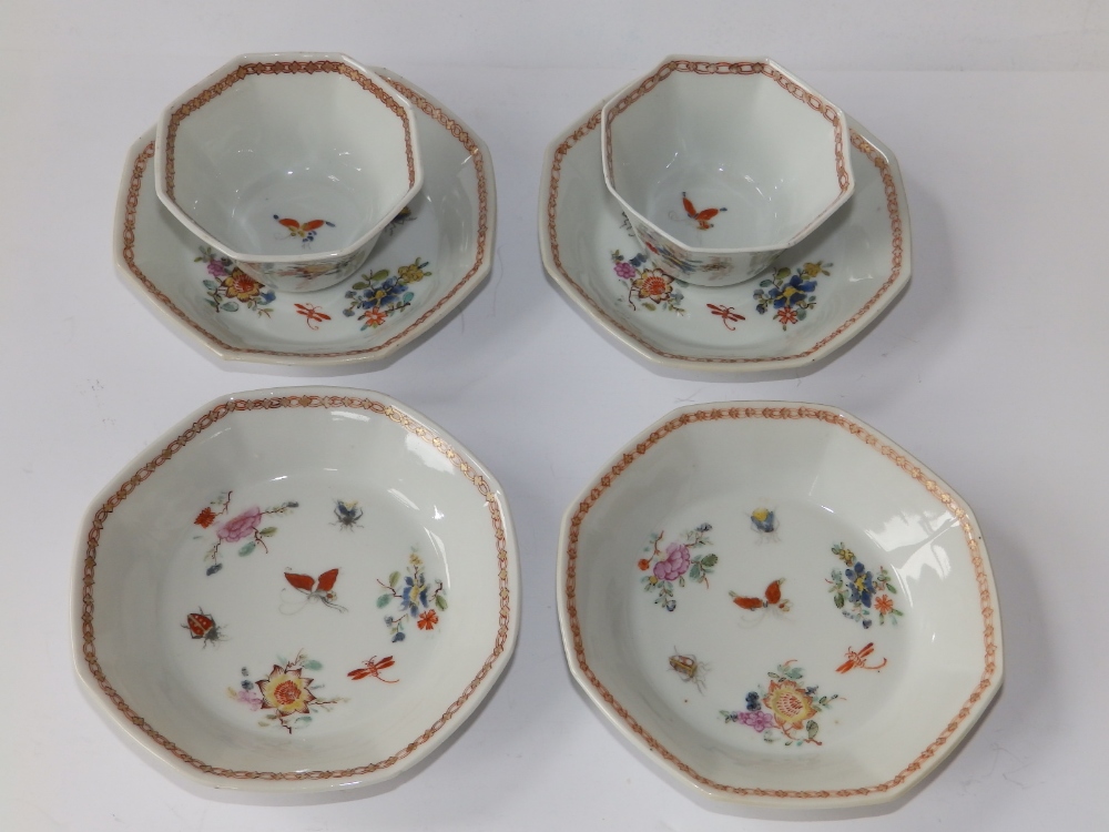 A pair of early 19thC Oriental porcelain octagonal tea bowls together with four saucers painted in