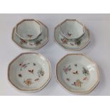 A pair of early 19thC Oriental porcelain octagonal tea bowls together with four saucers painted in