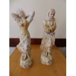 A pair of continental biscuit porcelain figures – Winter & Summer, 18” high.