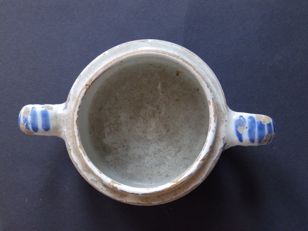 An 18thC two-handled faience jar, decorated flowers and arabesque scrolls in iron red, green & blue, - Image 3 of 4