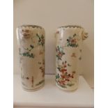 A pair of Oriental earthenware cylinder vases painted flowers – one a/f.