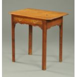 A George III oak side table, with canted angles and fitted with a single frieze drawer,