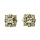 A pair of 18 ct gold diamond stud cluster earrings.
