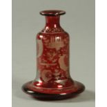 A 19th century Bohemian ruby glass flask, with label to base "R. Cruickshank". Height 14 cm.