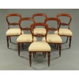 A set of six Victorian mahogany dining chairs, typical form,