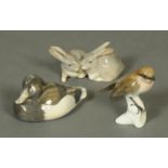 Two Royal Copenhagen figures, rabbits and duck, and a Rosenthal bird. Longest 11.5 cm.