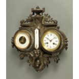 A 19th century French combined clock barometer and thermometer,