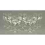 A set of seventeen 18 cm Baccarat wine glasses, each with etched mark to foot (see illustration).