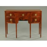A George III style mahogany bowfronted sideboard,
