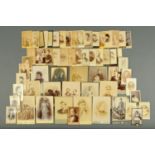 A quantity of Victorian mounted photographs, including Disraeli.