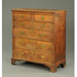 A George III oak chest of drawers,