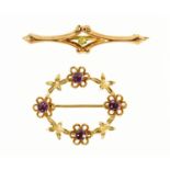 A 9 ct gold amethyst and foliate brooch, and a peridot set 9 ct gold bar brooch.