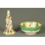 A 19th century green and gilt fruit bowl, and a Sitzendorf style figural candlestick.