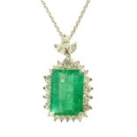 A large emerald and diamond cluster pendant, on 18 ct white gold chain, emerald weight +/- 9 carats,