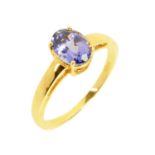 A 14 ct yellow gold tanzanite ring, size O/P.