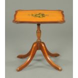 A mahogany and satinwood reproduction wine table, painted with flowers and with snap action.