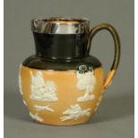 A Royal Doulton silver rimmed hunting jug, London 1901. Height 16.5 cm.