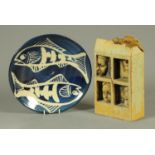 A Studio Pottery sculpture, "Faces in a Cereal Box" by Neil MacDonell, and a fish charger,