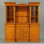 A Victorian oak breakfront bookcase,