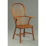 A 19th century Windsor stick back armchair,