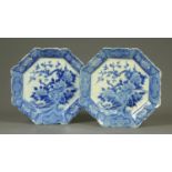 A pair of 19th century Japanese Arita chargers, blue and white, decorated with birds and branches,