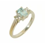 An 18 ct white gold diamond and aquamarine ring, total diamond weight .