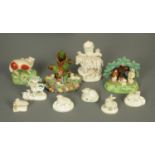 Ten Staffordshire and similar models of sheep, lambs and figures. Tallest 12 cm.