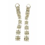 A pair of 18 ct white gold dropper earrings, set with diamonds weighing +/- .