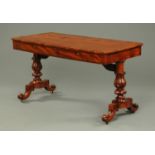 A William IV mahogany library table, with crossbanded top, rounded corners,