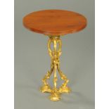 A 19th century ormolu table base, with later mahogany top. Diameter 40 cm.