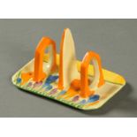 A Clarice Cliff toast rack, Crocus pattern Bizarre,