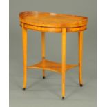 An Edwardian satinwood oval occasional table,