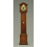 An oak cased grandmother clock, circa 1930,