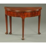 A George III mahogany demi-lune turnover top card table,