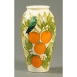 A Moorcroft vase, Finches by Sally Tuffin, First Quality. Height 26 cm (see illustration).