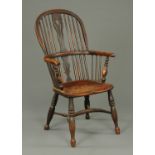 A 19th century Windsor armchair, with pierced splat back,