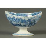 A 19th century blue and white transfer printed boat shaped bowl. Length 17 cm.