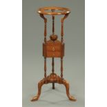 A George III mahogany basin stand, with circular top,