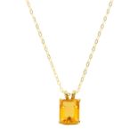 A gold and topaz pendant necklace.