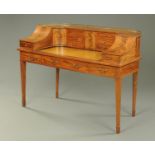 An Edwardian mahogany Carlton House style desk, typical form,
