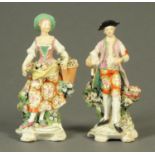 A pair of 19th century porcelain figures, man with lamb and woman with flowers. Height 22 cm.