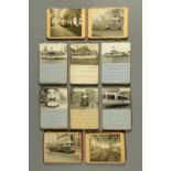 A set of ten photographs of trams, each with information beneath and mounted on a plywood plaque.