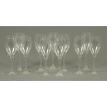 A set of eleven 19.5 cm Baccarat wine glasses, each with etched mark to foot (see illustration).