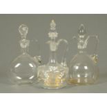 A Victorian glass decanter, decorated with lily of the valley and two others.