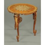 An early 20th century Indian inlaid ivory mother of pearl and ebony circular occasional table,